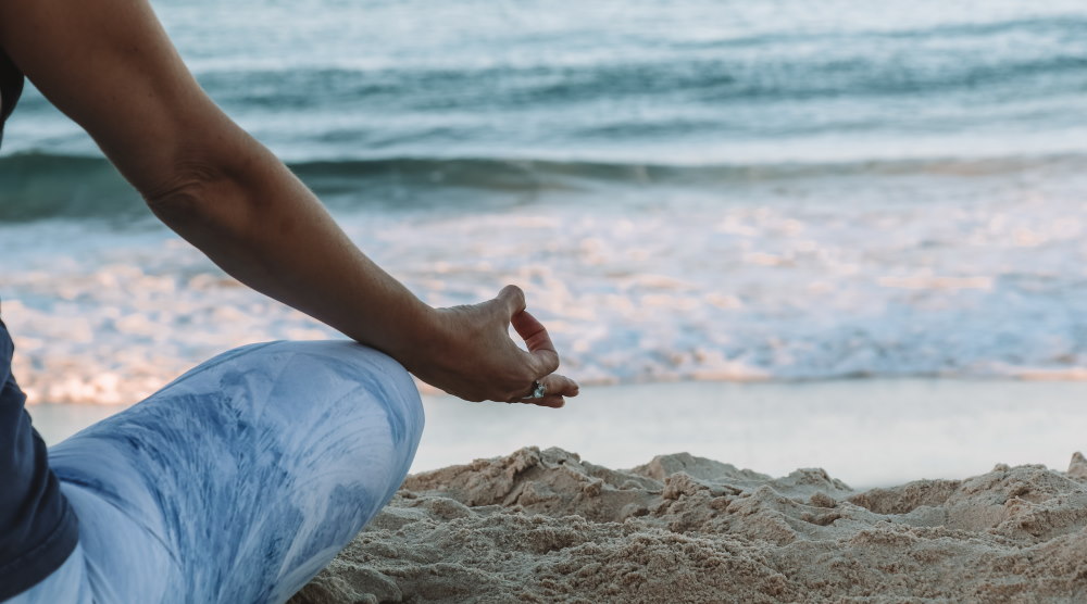 meditating by the beach