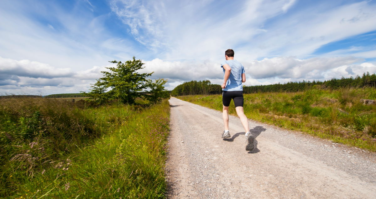 going for a run down a trail