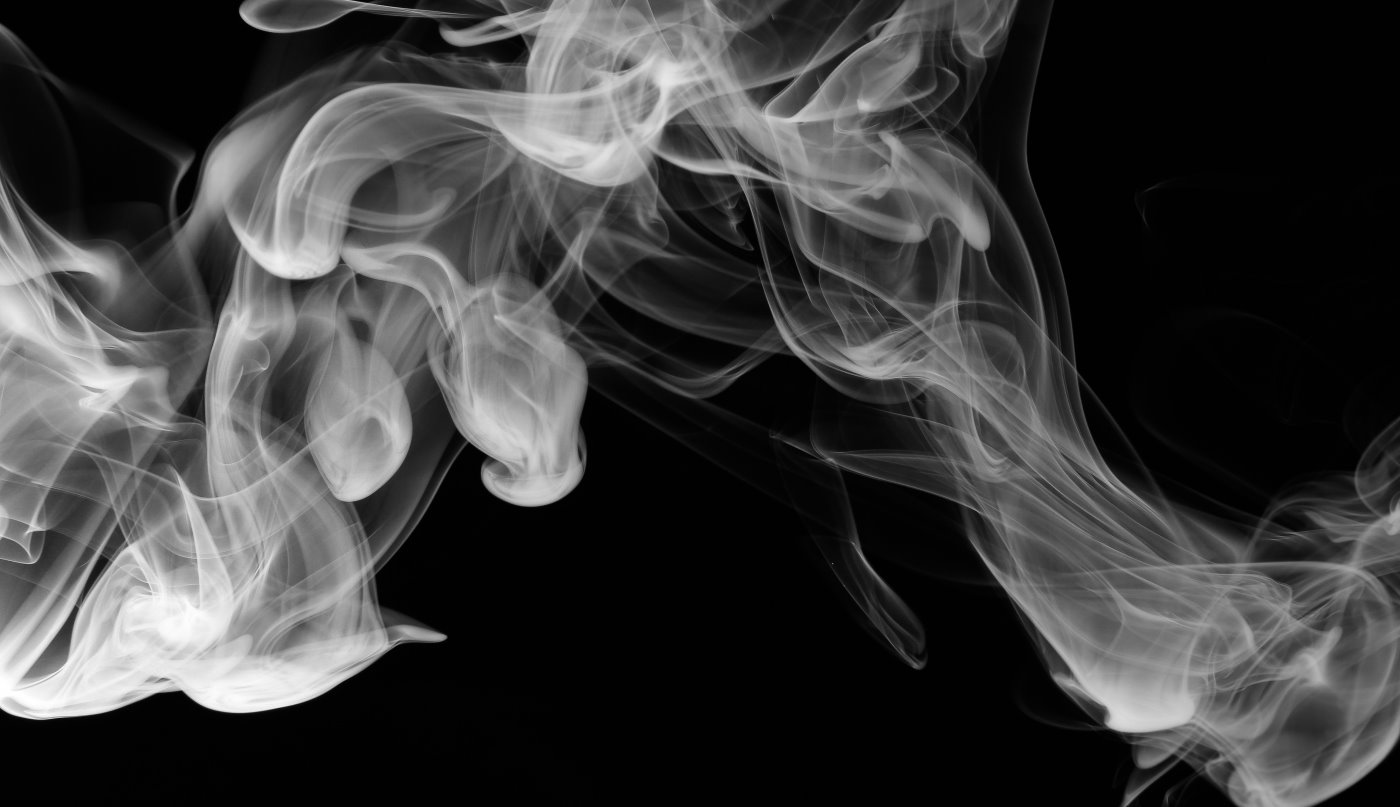 smokie spreading over black background